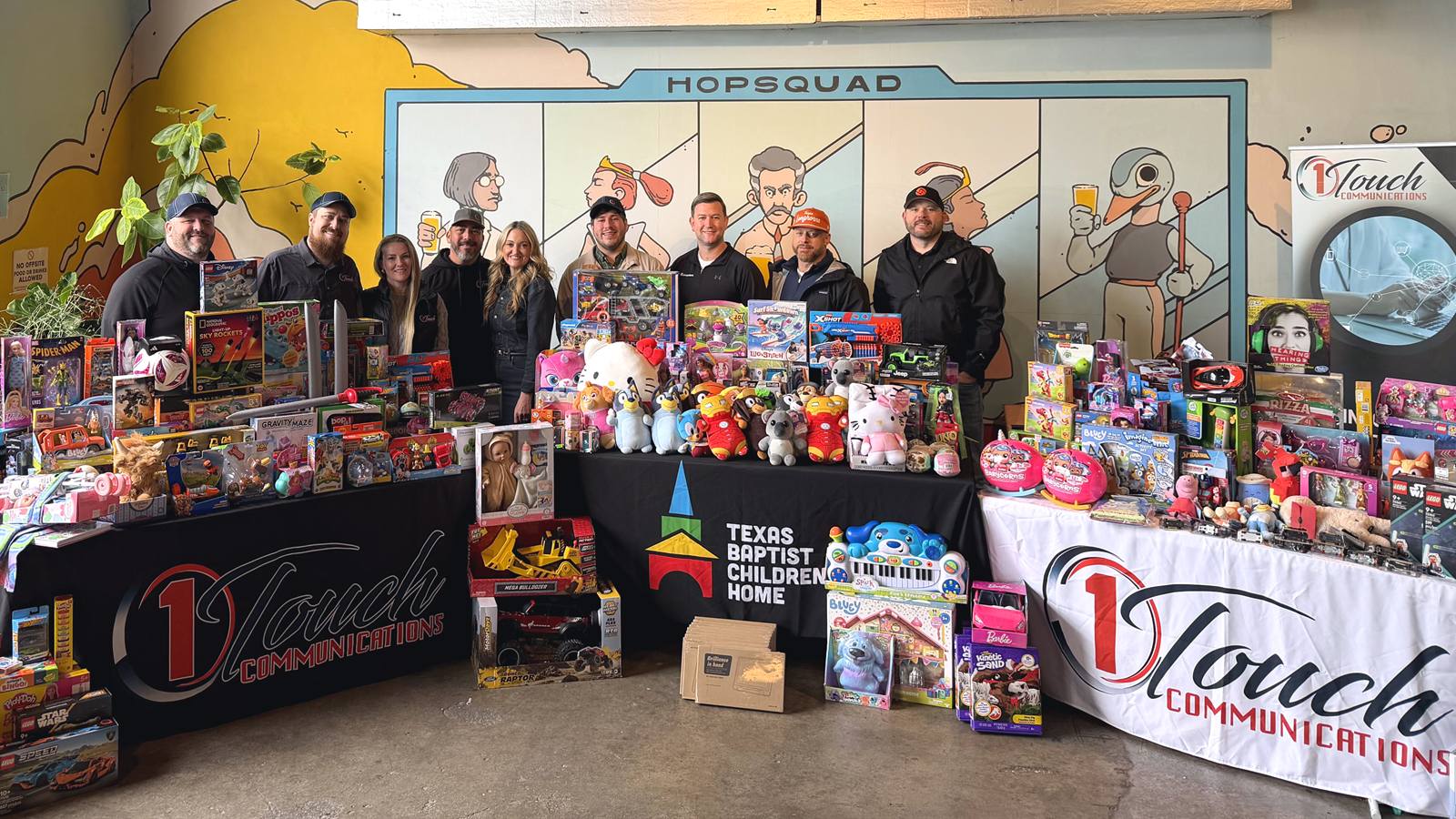 The 1 Touch Communications team at a toy drive benefiting Texas Baptist Children's Home